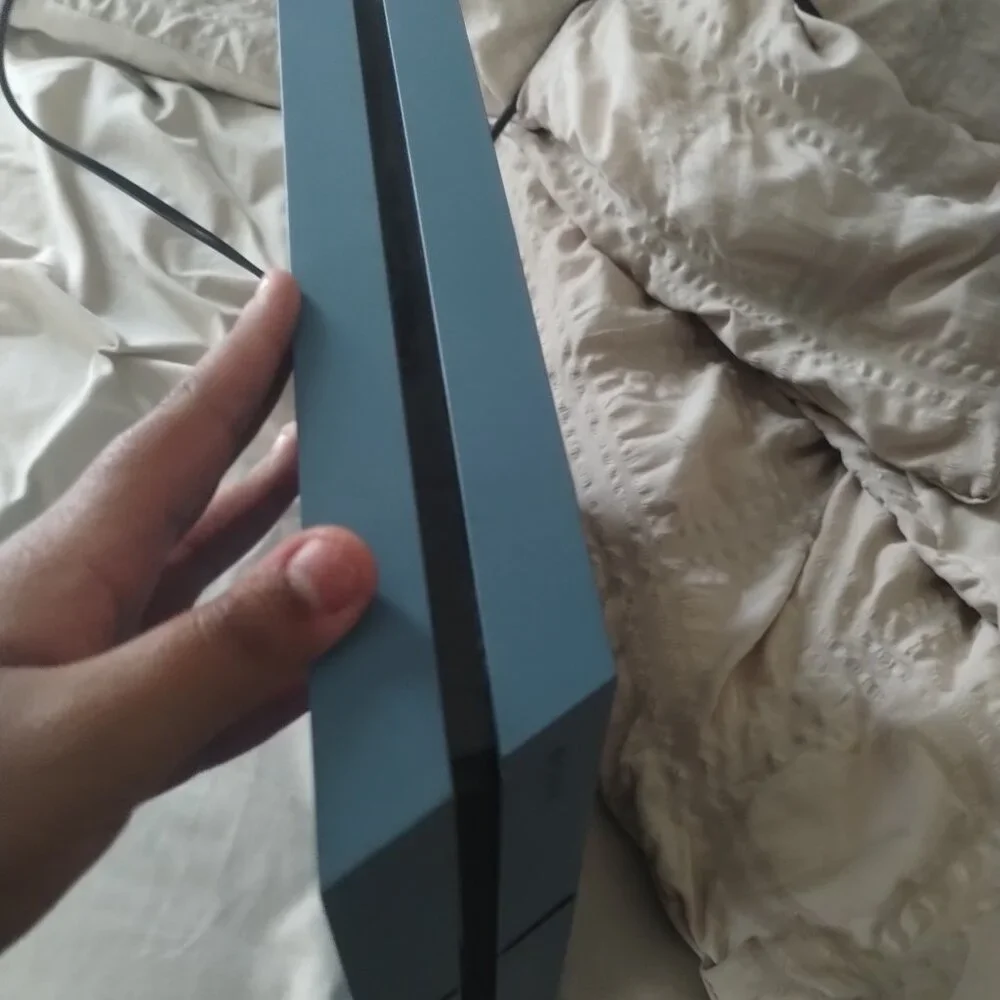 Limited edition PS4 with HDMI power cord and controller